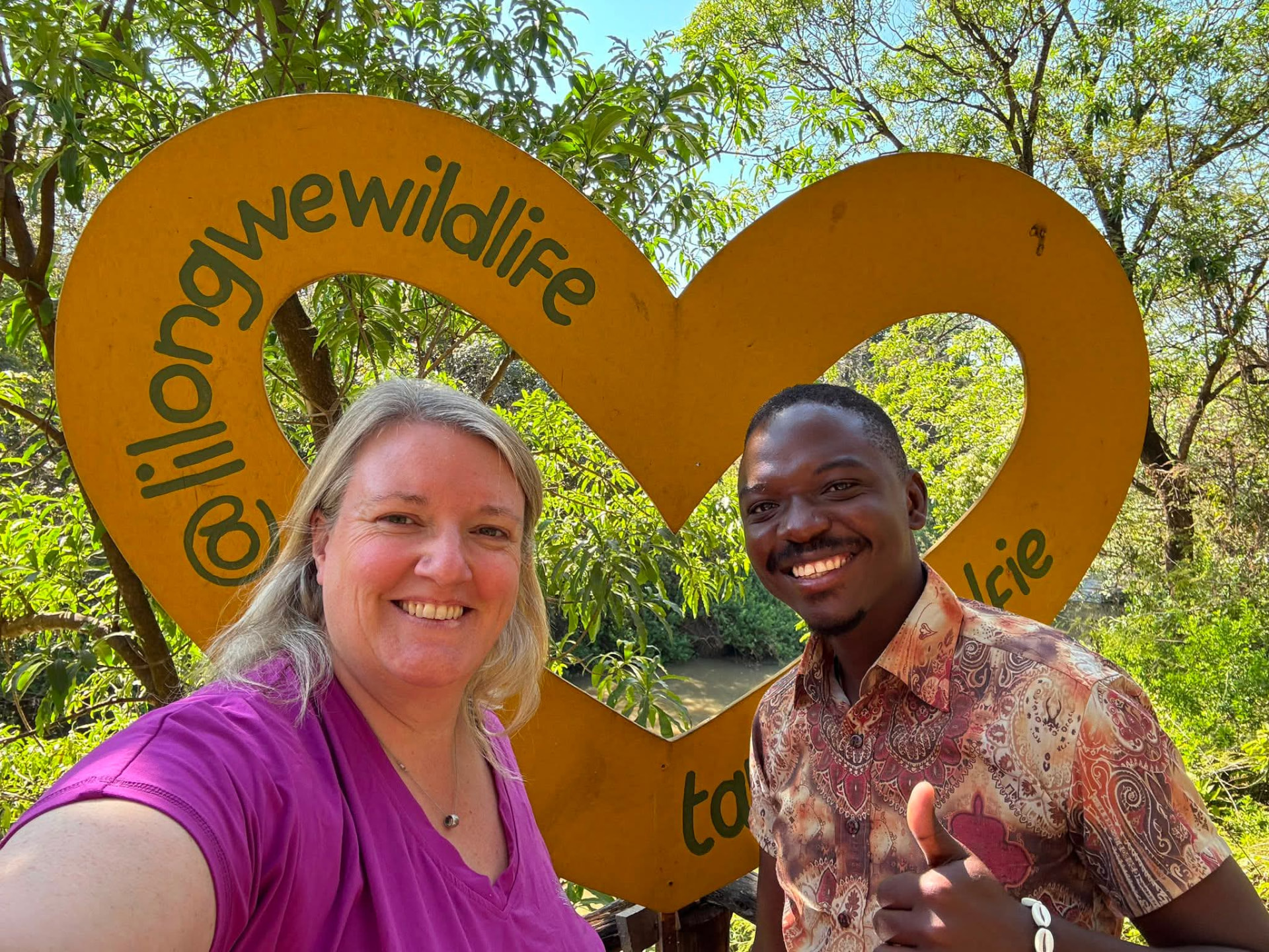 Guide Brown Raymond Simkonda with a guest at Lilongwe Wildlife Centre